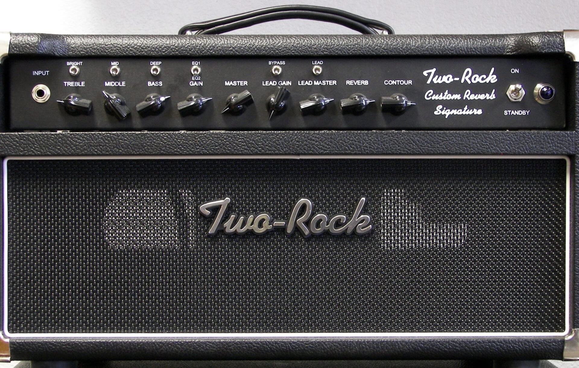 The Two-Rock Custom Reverb Signature Amp is pictured.