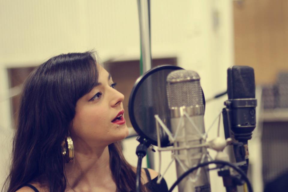 Author Eirini Tornesaki is pictured here recording vocals at the famed Abbey Road studios.