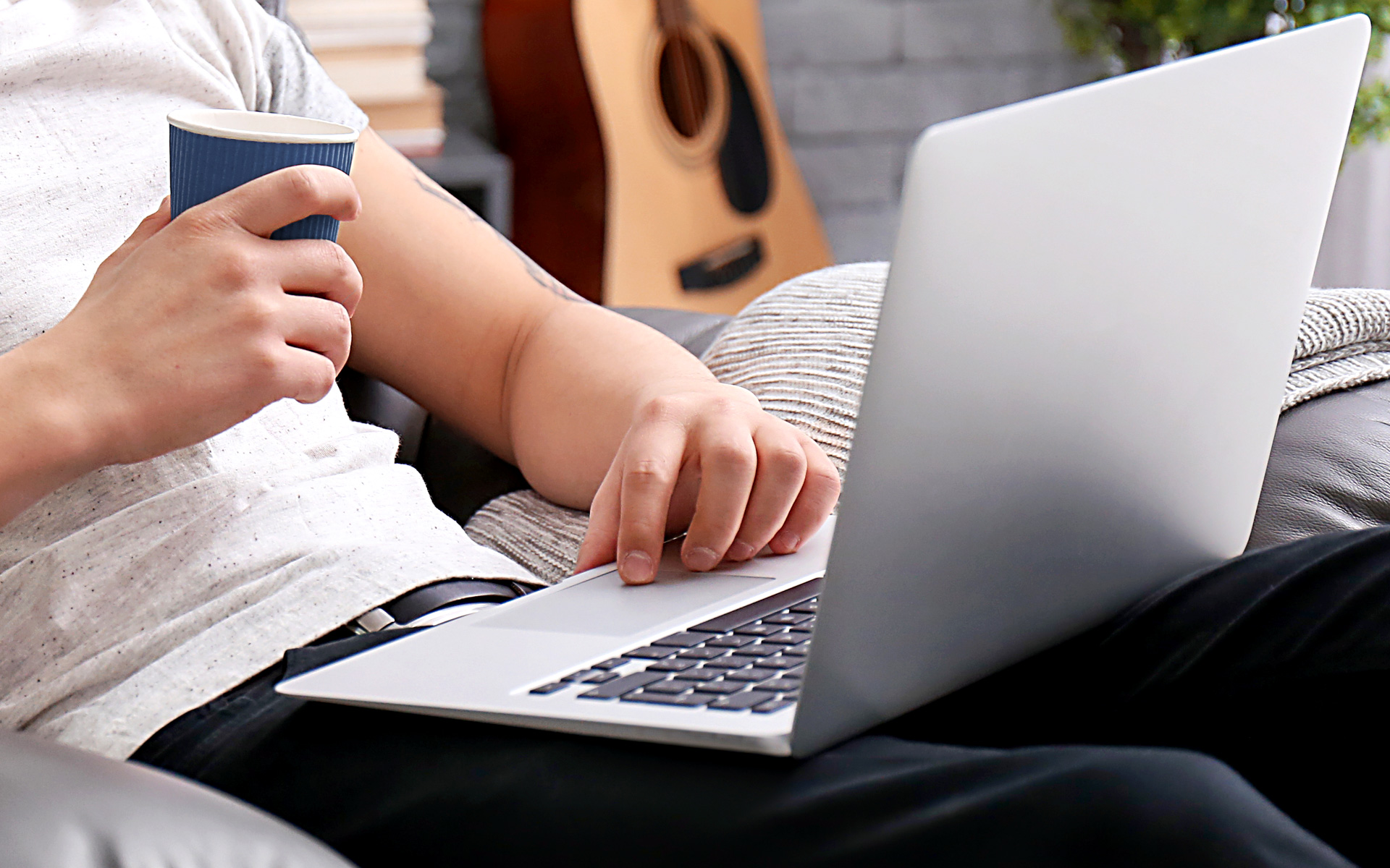 A student taking online classes on their laptop.