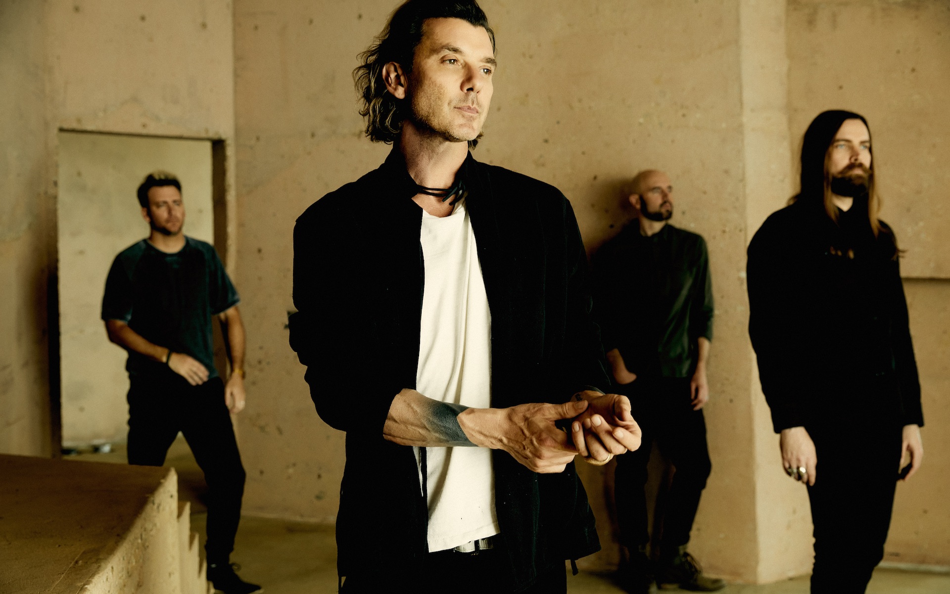 Gavin Rossdale is pictured with other members of the band Bush.