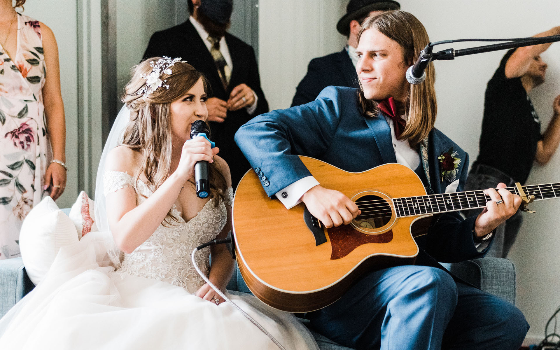 Bethany and Blake Jourasin singing at their wedding.