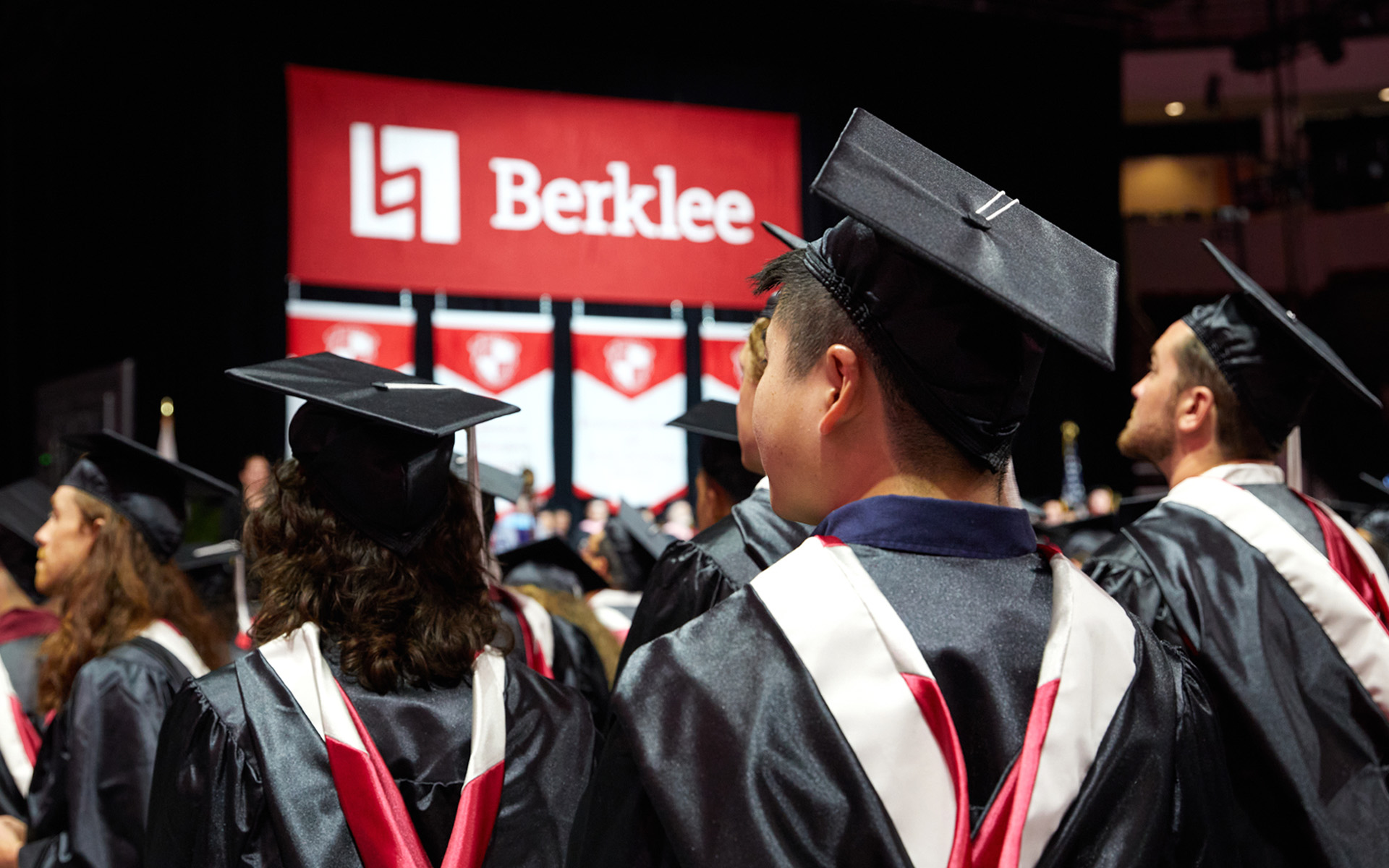 Berklee Online graduates with their caps and gowns on at Commencement.
