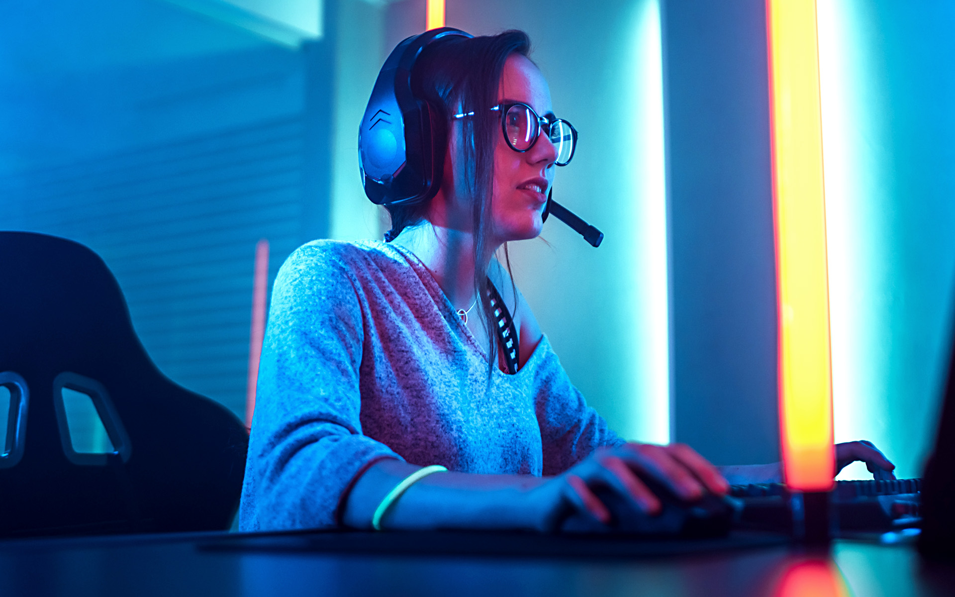A woman plays a video game.