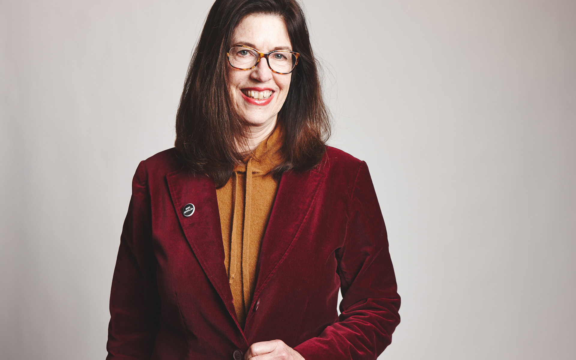 Psychoacoustics in Music Production course author Susan Rogers is pictured in a burgundy blazer.
