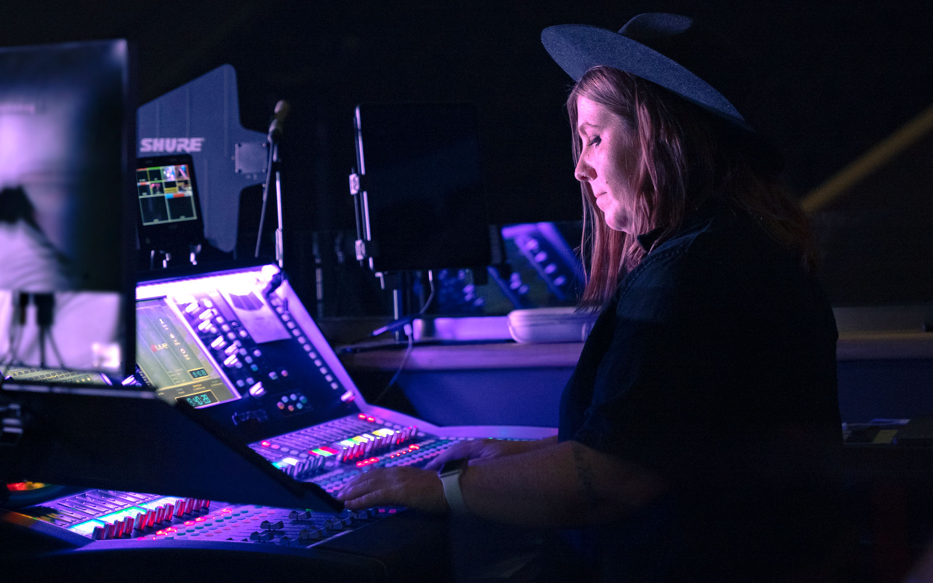 Alex Priore working at a sound board