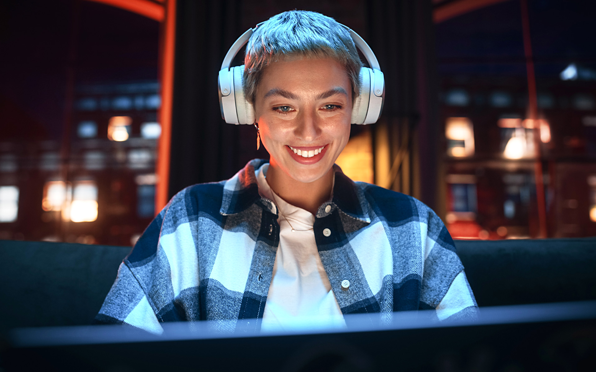 A musician uploads their music to a music distribution portal.