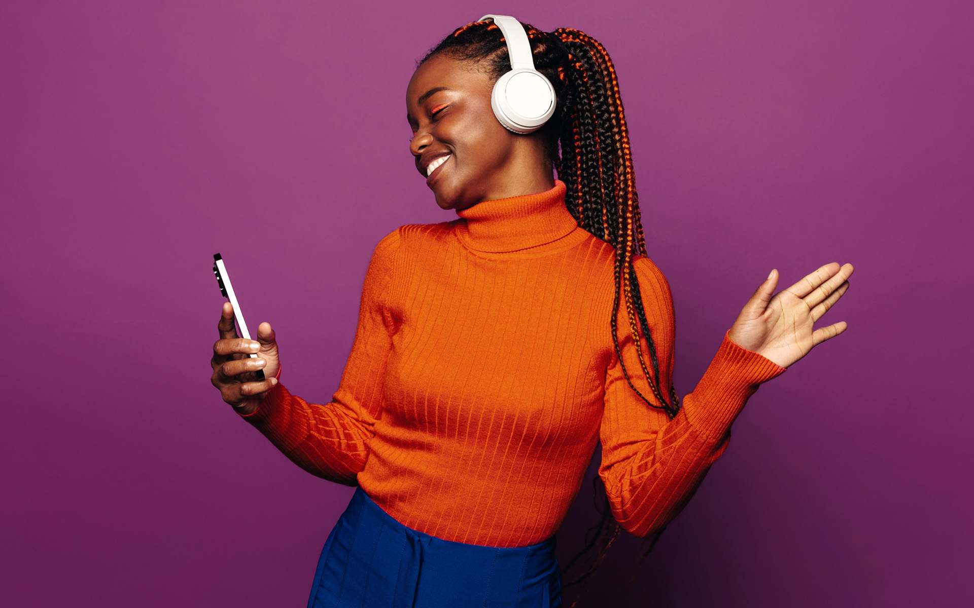A woman listening to her music on a Spotify playlist