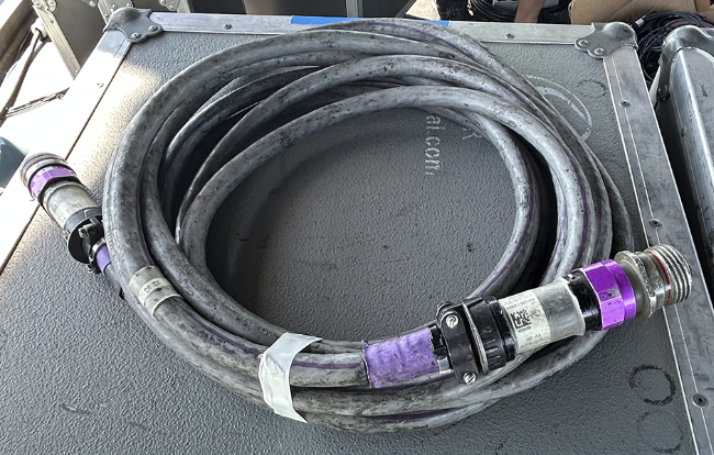 A screen grab of a black 14-channel digital sub snake is pictured on a grey background
