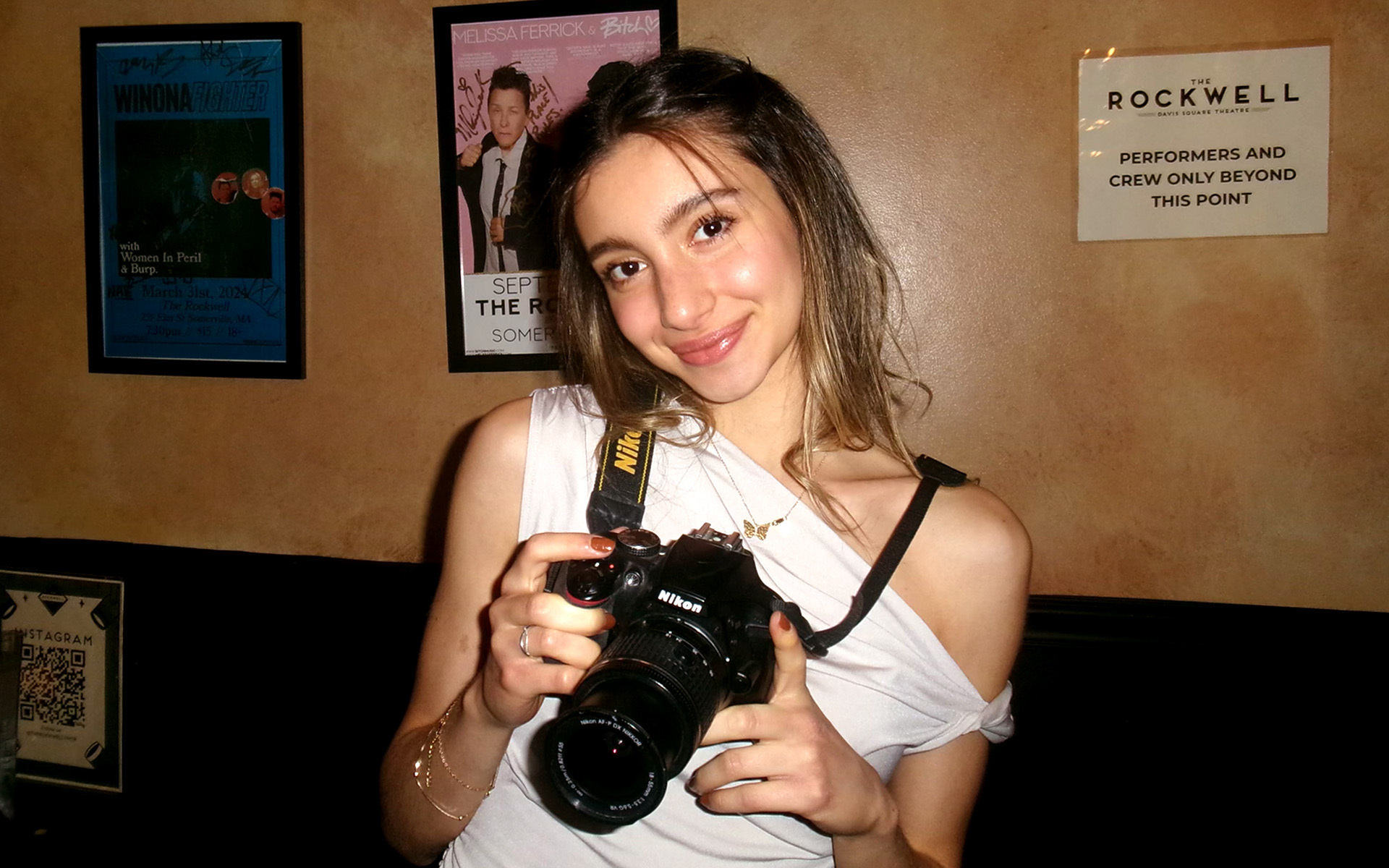 Ale Gil is pictured backstage at a show of one of the artists she manages.