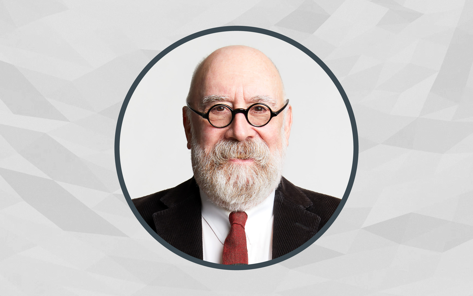 A portrait of Berklee Online instructor Sean Slade framed inside of a circle, with a gray background.