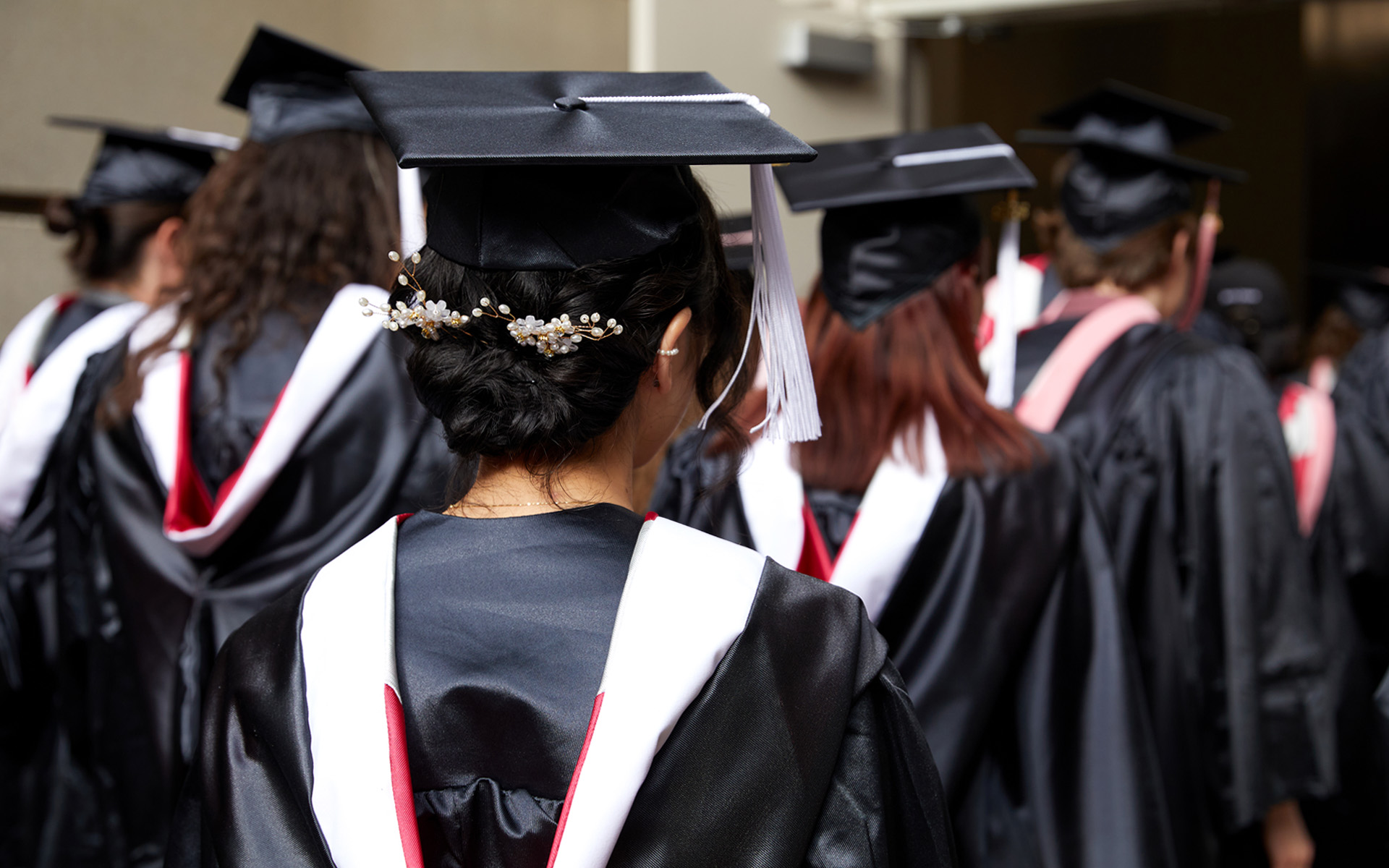 Berklee Online students waiting in line to walk at Commencement.