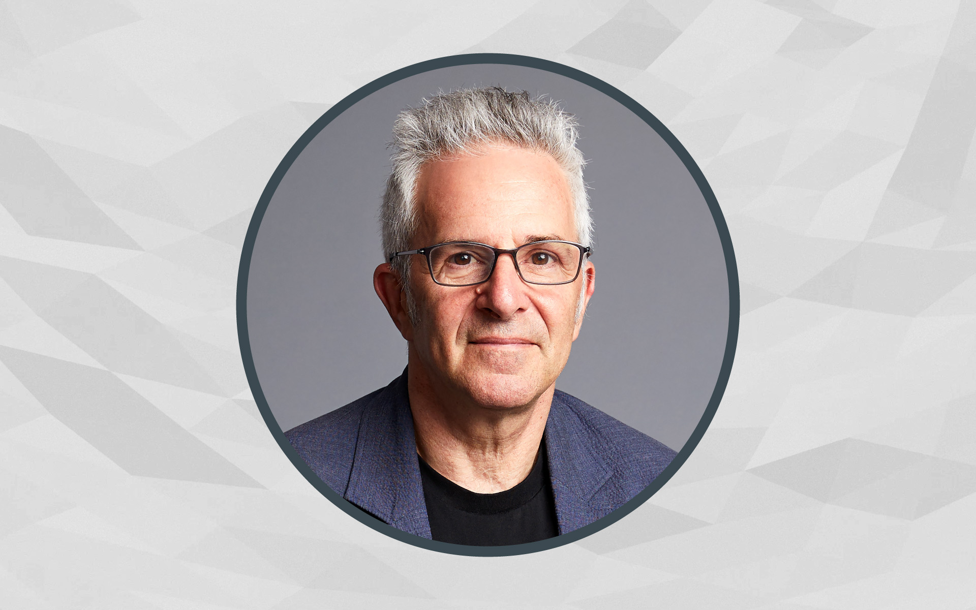 A portrait of Berklee Online instructor Jonathan Wyner framed inside of a circle, with a gray background.