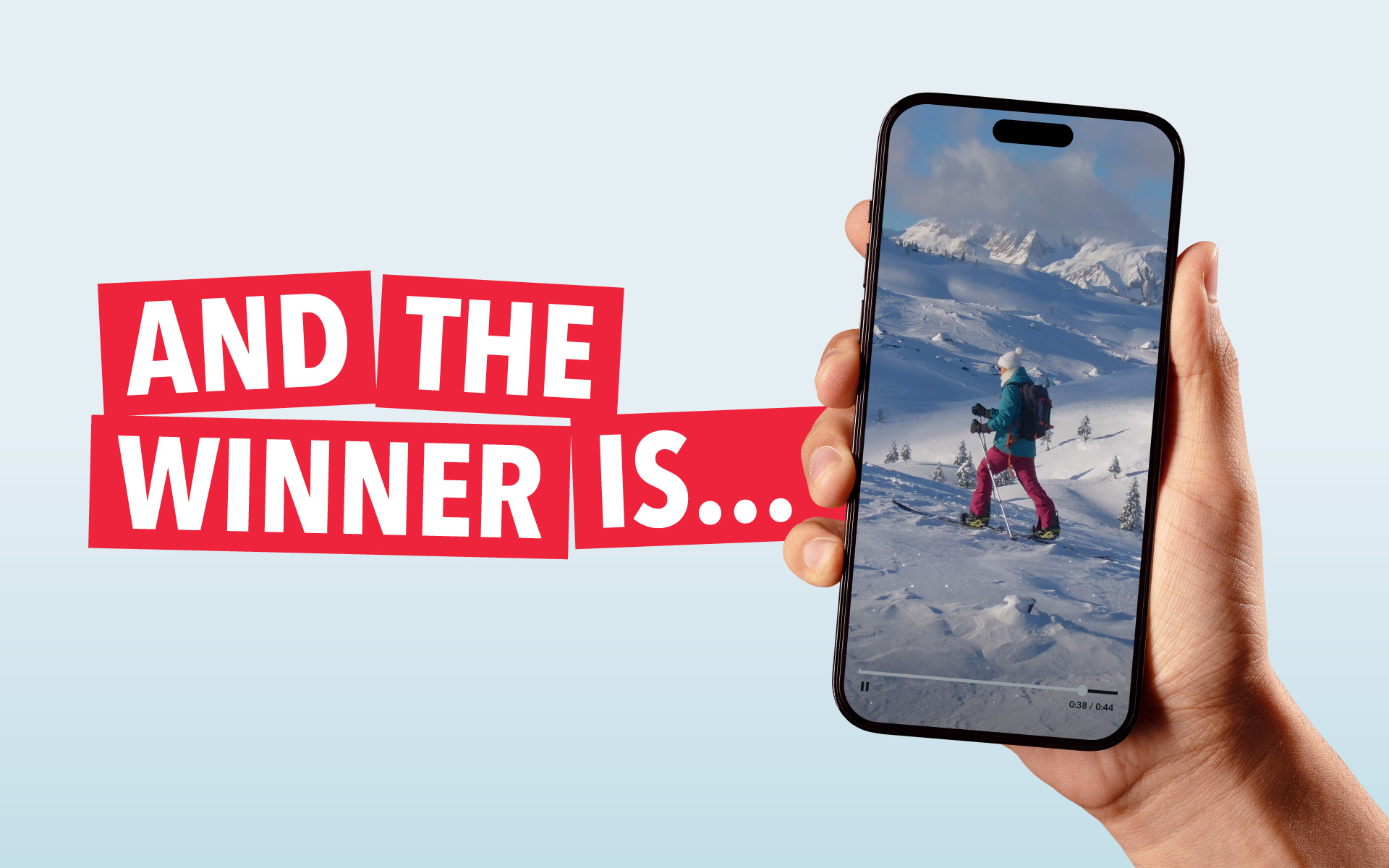 Berklee Online Announces the Winner of Music Supervision Song Sync Contest A hand holds out a smartphone, with an image of a skier on the mountains and text announces: And the Winner Is …